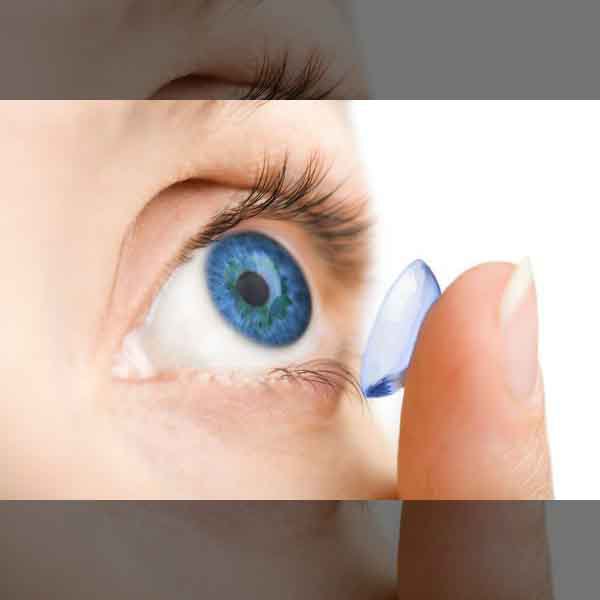 Person Inserting Contact Lens